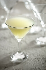 A glass of natural whey on a bright background