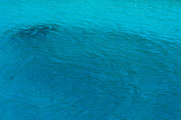 The blue surface of the Aegean Sea top view. Natural background.