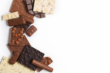 Many various chocolate bars and nuts