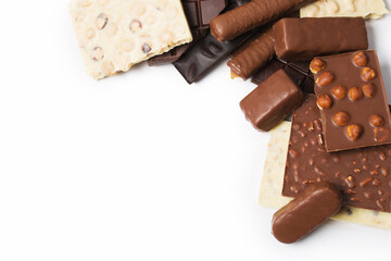 Many various chocolate bars and nuts