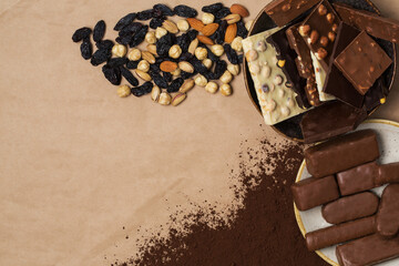 Many various chocolate bars and nuts