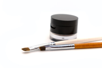 Brushes and shadows for professional correction and coloring of eyebrows on a white background