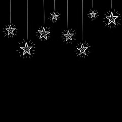 festive garland of shining stars on a black background