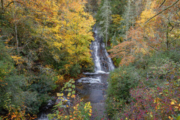 Beautiful autumn landscape shot of Connestee Falls and Carson Creek