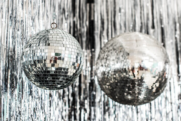 Festive background. disco ball on beige and silver background. Christmas. Wedding. Birthday