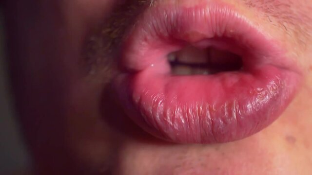 male mouth kissing air.close-up .shallow depth of field