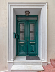 Contemporary house entrance green painted door, Athens Greece