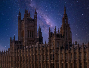 London, England, the British parliament's impressive building under the starry night sky.