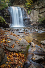 Colorful fall leaves accent Looking Glass Falls in Pisgah Forest.tif