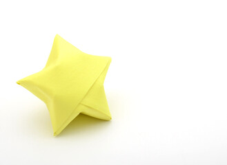 a lucky origami star on the white