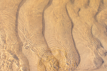 ripple marks at the bottom of the river