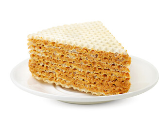 Waffle cake piece on a plate on a white background. Isolated