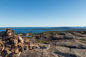 Fototapeta na wymiar Cairn on a high island in the High Coast area in Vasternorrland Sweden.