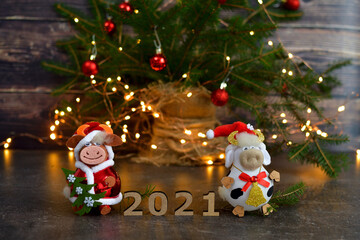 christmas background with spices, candy cane, fir tree and gingerbread man. Gingerbread cookies numbers 2021.Festive Winter Holidays concept.Copy space for text.