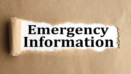 emergency information, text on white paper on torn paper background