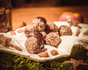 Homemade Christmas biscuits and decoration on wooden table