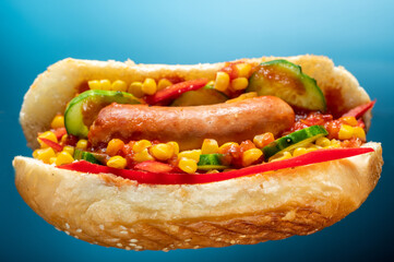Hot dog with corn and vegetables. Photo of a hot dog in an open position.