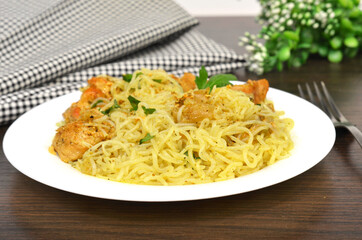 Konjac or Shirataki noodles with pork, grilled meat and herbs. Japanese traditional dish. Healthy food for weight loss, keto diet concept. Rice glass noodles