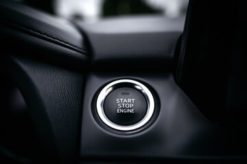 Close up Engine start stop button from a modern car interior