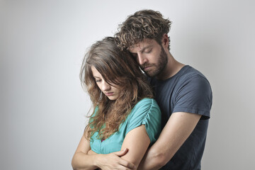 portrait to young couple embracing