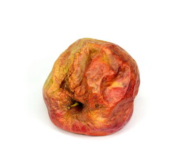 Rotten dry apple isolated on a white background