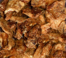 Heap of domestic salty fried pork greaves, cvarci, background.