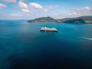 Large Cruise ship sailing across The Andaman sea - Aerial image. Beautiful  sea landscape