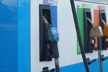 A angle side veiw of the oil dispenser multi type of  a automobile refuel oil service.