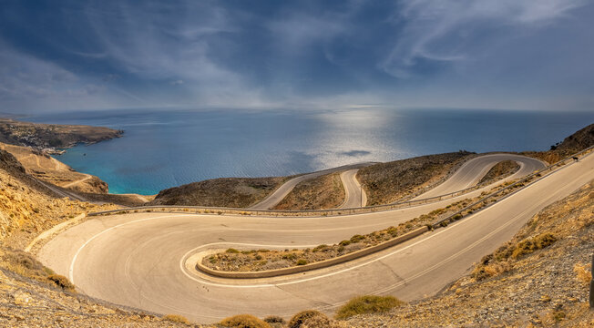 Breathtakingly steep and curvy roads climbing the coastal cliffs of the Sfakia region of Southern Crete, Greece