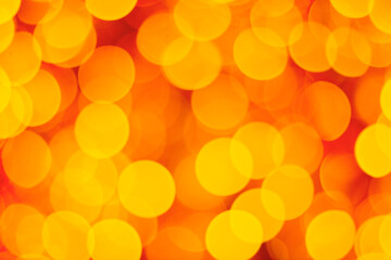 Golden yellow abstract holiday bokeh background.