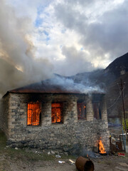 Fototapeta na wymiar Nagorno-Karabakh: Ethnic Armenians set fire to their homes rather than hand them to Azerbaijan