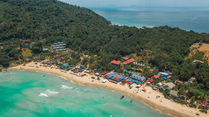 Aerial view of Long Beach at Perhentian Islands, Malaysia. Turquoise blue water beach. Drone shot.