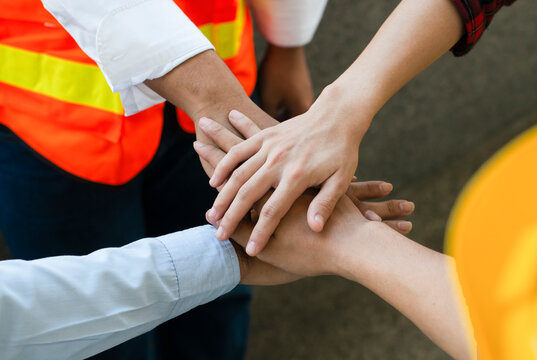 Engineer wearing mask , helmet standing cargo at the container yard and Check container integrity Before exporting products abroad. Shipping import, export industrial and logistics concept.