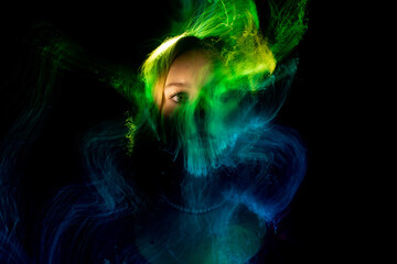 lightpainting portrait, new art direction, long exposure photo , light drawing at long exposure