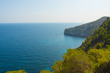 Beautiful mediterranean coast with cliff and forest. Paradise view.