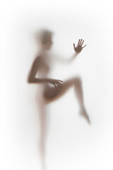 Obraz na płótnie Canvas Beautiful slim woman body diffuse, blurry silhouette, sharp hands and fingers. 