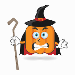 Obraz premium The Pumpkin mascot character becomes a magician. vector illustration