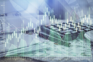 Fototapeta na wymiar Double exposure of financial chart drawings and desk with open notebook background. Concept of forex market