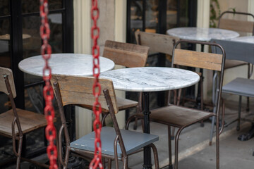 CHAIRS AND TABLE IN BAR TERRACE IN THE CENTER OF THE CITY OF MADRID