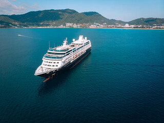 Large Cruise ship sailing across The Andaman sea - Aerial image. Beautiful  sea landscape