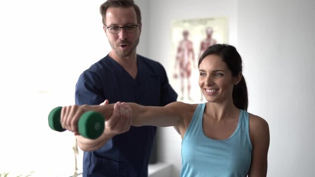 Physiotherapist worker doing treatment to his client