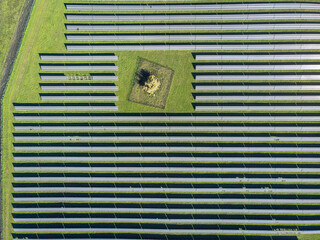 Aerial top view of a solar pannels power plant. Renewable energy concept