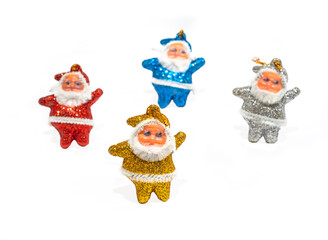 Multi-colored Santa Claus on a white background. Copy space.