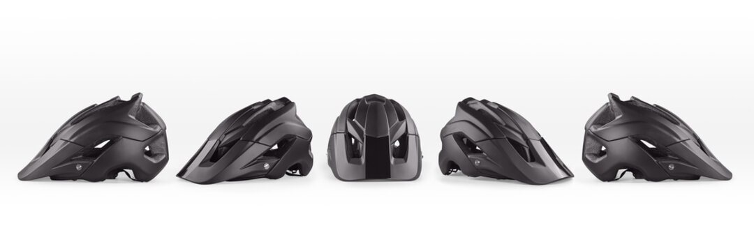 Black bicycle helmets set isolated with clipping path