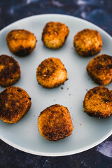 plant-based food, homemade fried vegan pesto risotto balls arancini