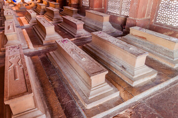 FATEHPUR SIKRI, INDIA - FEBRUARY 17, 2017: Graves in the tomb Islam Khan in the ancient city Fatehpur Sikri, Uttar Pradesh state, India
