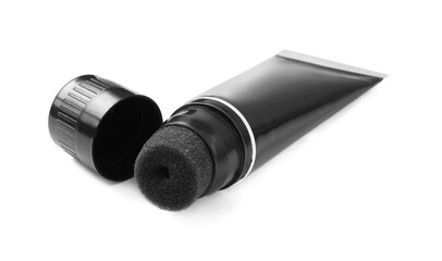 Tube of shoe care product isolated on white. Footwear cleaner