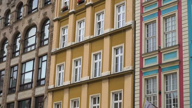 row of beautiful colorful buildings facades at the Wroclaw city old town, Poland
