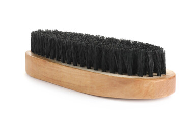 New wooden brush isolated on white. Shoe care product