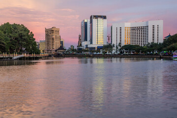 Fototapeta na wymiar Evening view of Sarawak river in the center of Kuching, Malaysia